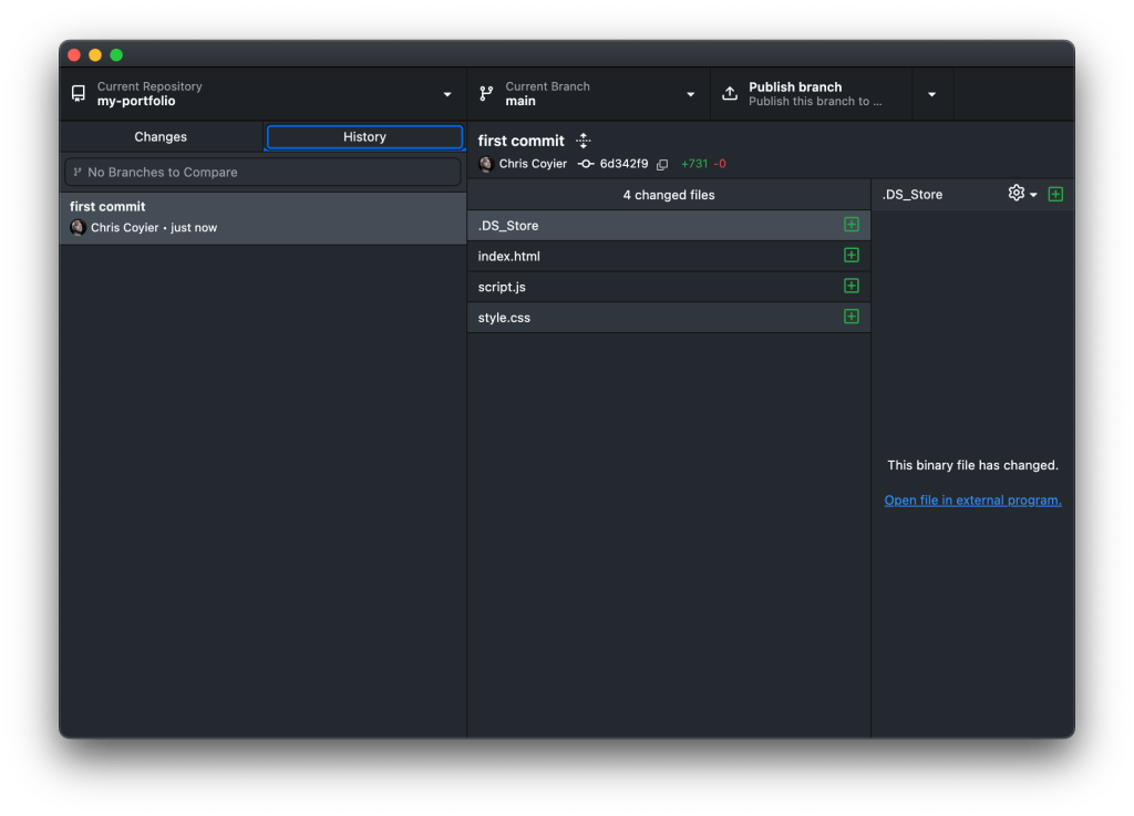 Screenshot of the GitHub Desktop application showing the first commit in a repository named 'my-portfolio', with a list of changed files including index.html, script.js, and style.css.
